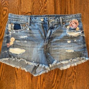 American Eagle denim shorts with embroidered detail, size 10
